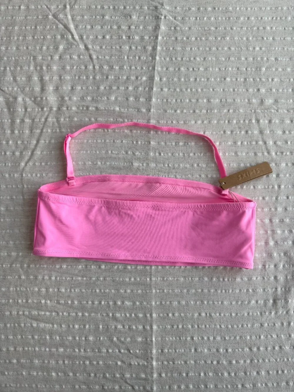 SKIMS Light Pink Recycled Swim Bandeau Bikini Top in Medium
